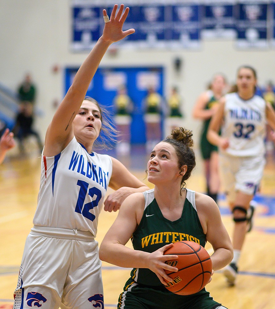 Bulldog Gracie Smyley posts up during Friday&#146;s road loss to Columbia Falls. (Chris Peterson/Hungry Horse News)