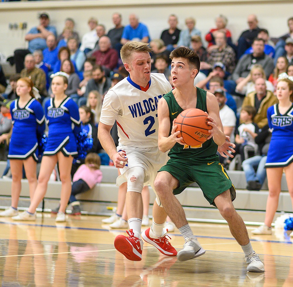 Bulldog Danny Davis drives to the hoop during Friday&#146;s road loss to Columbia Falls. (Chris Peterson/Hungry Horse News)