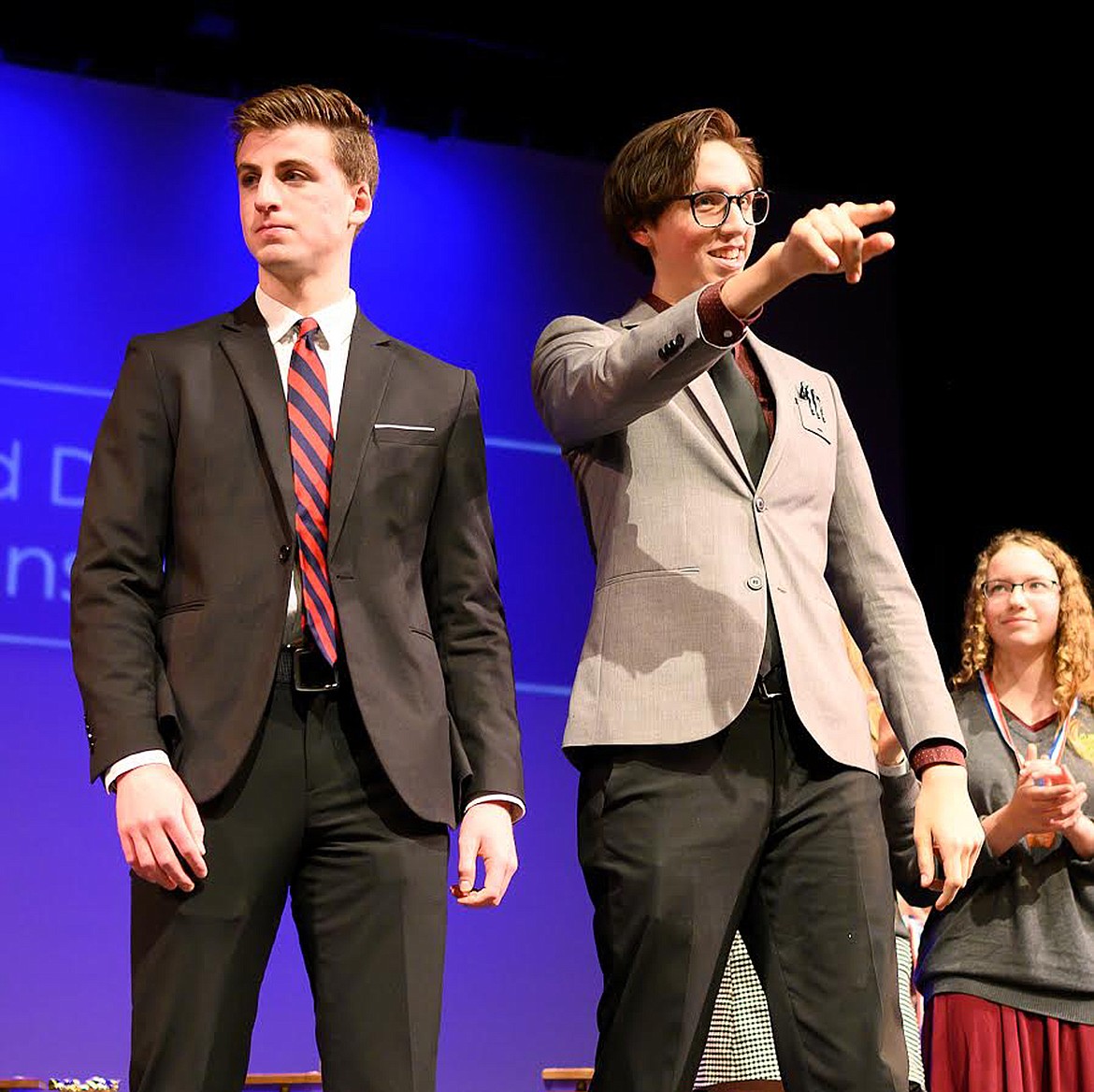 Polson's Joseph McDonald, right, and Davis Smith, celebrate their win Saturday in the Public Forum category at the Montana Class A State Speech and Drama Tournament at Whitefish High School. Their question was 'Should the U.S. end economic sanctions on Venezuela?' The duo's win was their seventh straight. McDonald said he will be attending Stanford University and majoring in computer sciences. Davis said he will attend Columbia University in New York City. He will major in classical science. (Chris Peterson/Hungry Horse News)