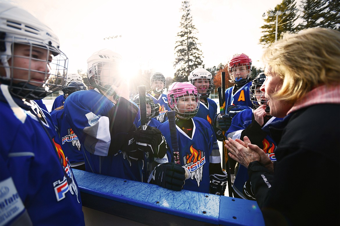 Flathead Lady Fusion head coach Lini Reading speaks to her team before their game against the Lethbridge Cyclones during the 14U Girls Winter Classic 2020 at the Woodland Ice Center in Kalispell on Friday. (Casey Kreider/Daily Inter Lake)