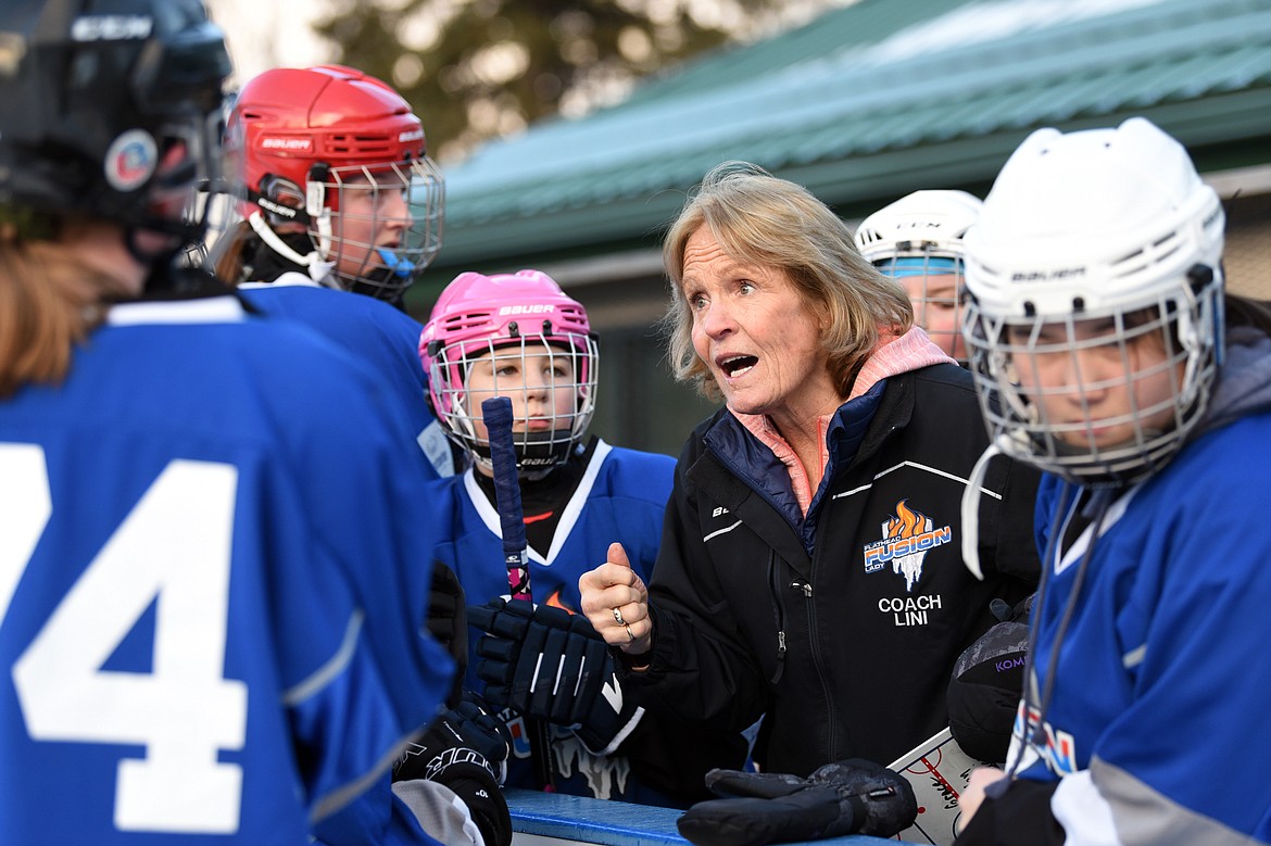 Flathead Lady Fusion head coach Lini Reading speaks to her team during a break in the game against Lethbridge.