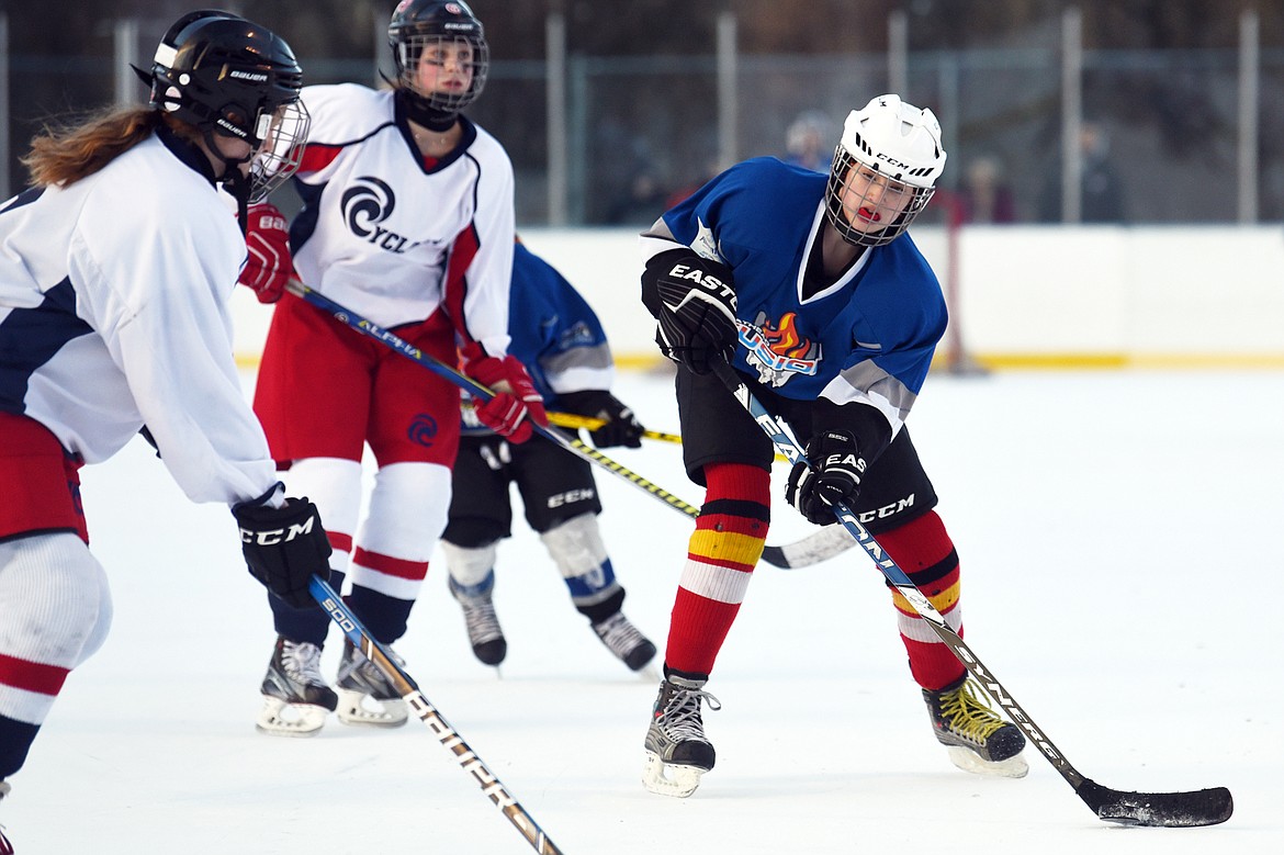 Margo Cummings (25) readies a wrist shot against the Lethbridge Cyclones defense during the 14U Girls Winter Classic 2020 at the Woodland Ice Center in Kalispell on Friday. (Casey Kreider/Daily Inter Lake)