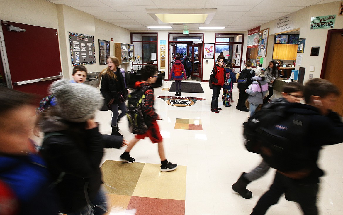 Ramsey Magnet School of Science students head home for the day after school Jan. 6. The Coeur d&#146;Alene School District is hosting the second public open house addressing boundary revisions from 6 to 8 tonight at Woodland Middle School. (LOREN BENOIT/Press)