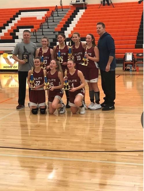 Courtesy photo
The North Idaho Elite eighth-grade girls basketball team captured the Spokane AAU championship, winning 66-34 in the title game. This was their third time playing in the championship game and their second championship. In the front row from left are Sophie Carbajal, Brooklynn Brennan and Sophia Zufelt; and back row from left, coach Terry Zufelt, Payton Sterling, Kurtsten McKellips, Avery Waddington, Kamryn Pickford and coach Kevin Pickford.