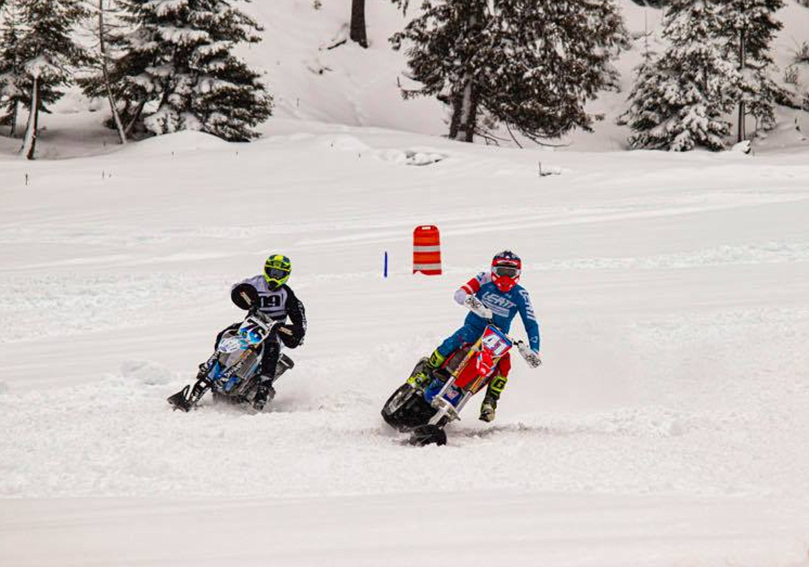 Courtesy photo
Racers at the 4th annual SnowBeast Snowbike races in Mullan round a corner during one of the many exciting races this past weekend.