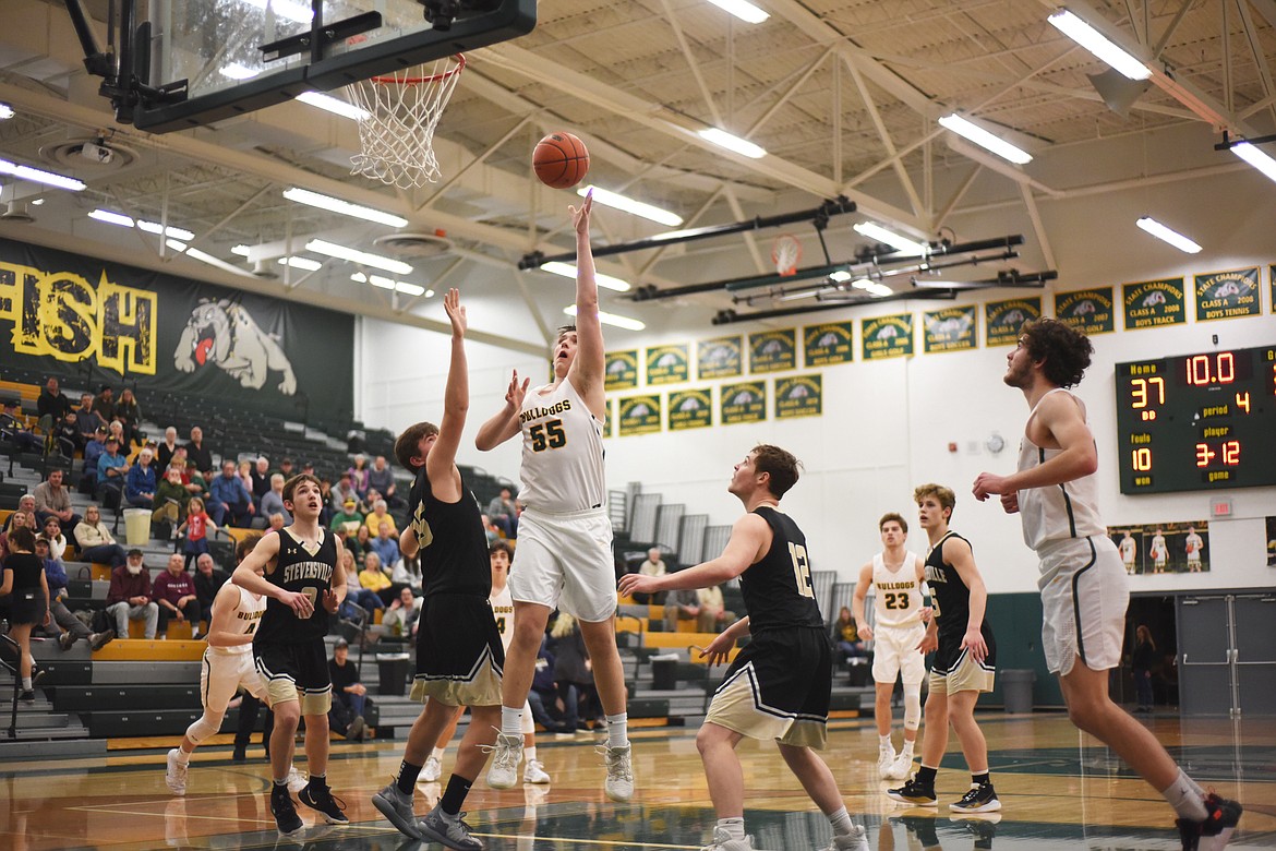 Talon Holmquist tries to end the game in regulation during Friday&#146;s home battle against Stevensville. (Daniel McKay/Whitefish Pilot)