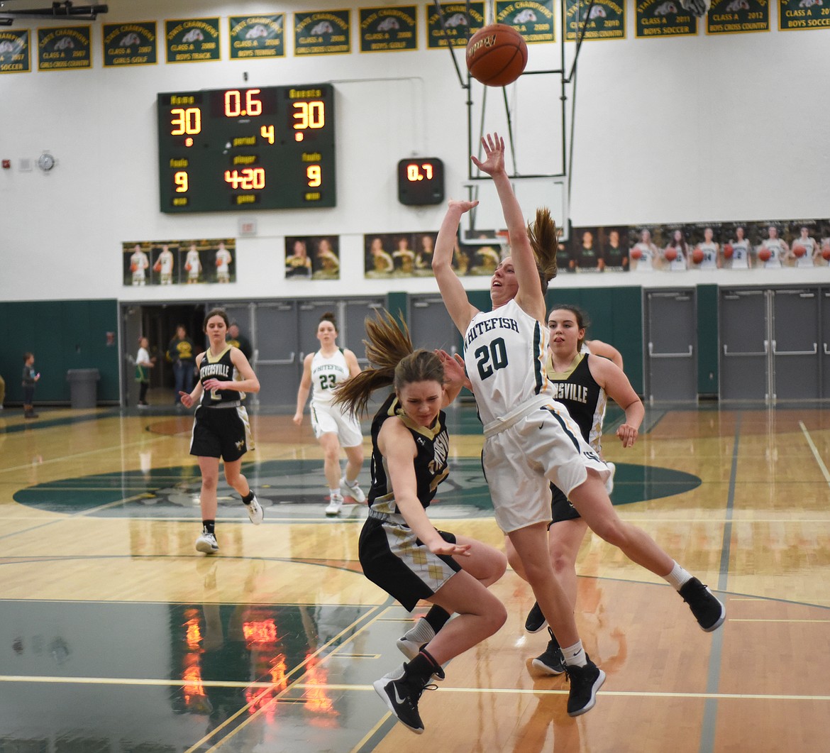 Mikenna Ells draws the foul before sinking the game-winning free throw in Friday&#146;s home win over Stevensville. (Daniel McKay/Whitefish Pilot)