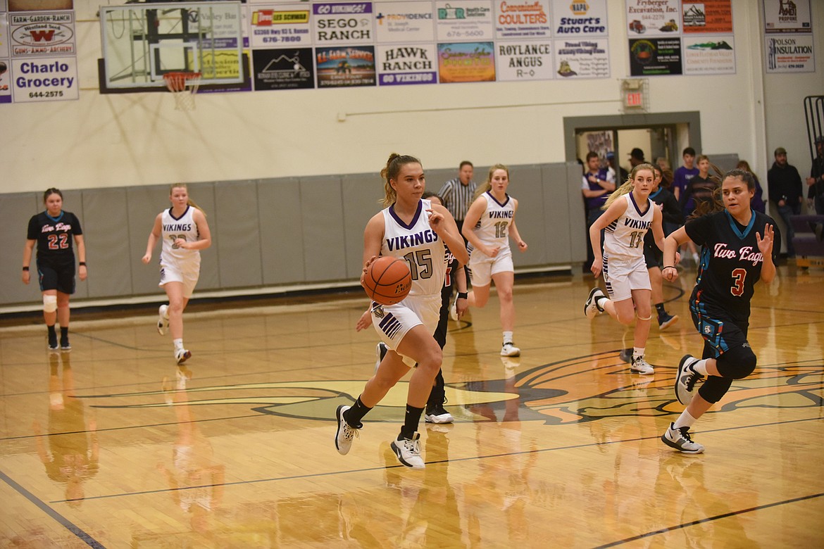 Charlo senior Destiny Manuel (15) charges upcourt in Friday&#146;s game against Two Eagle River. Manuel scored 14 points as the Lady Vikings claimed an 80-10 win. (Scott Shindledecker/Lake County Leader)