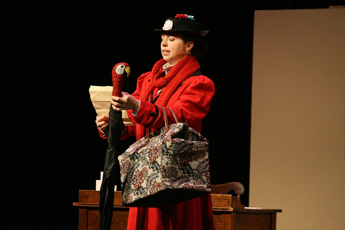 Cheryl Schweizer/Columbia Basin Herald | Mary Poppins (Stephanie Moore) has come about the advertisement in the Quincy Valley Allied Arts production, which opens this week.