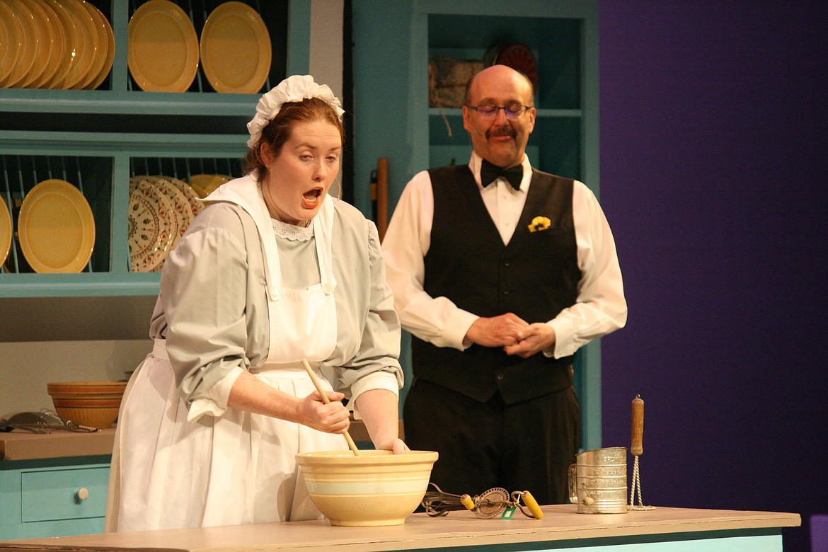 Cheryl Schweizer/Columbia Basin Herald | Mrs. Brill (Alison Pheasant), the Banks family cook, is feeling the pressure in the Quincy Valley Allied Arts production of &#147;Mary Poppins.&#148; The family servant (Galen Golay) just tries to stay out of the way.