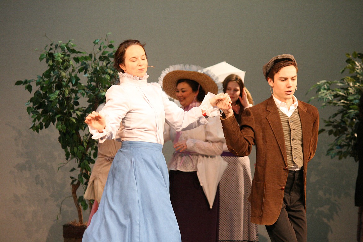 Cheryl Schweizer/Columbia Basin Herald | Mary Poppins (Stephanie Moore, left) and Bert (Taylor Street) enjoy a dance in Hyde Park. The premiere of the Quincy Valley Allied Arts production is Feb. 20.