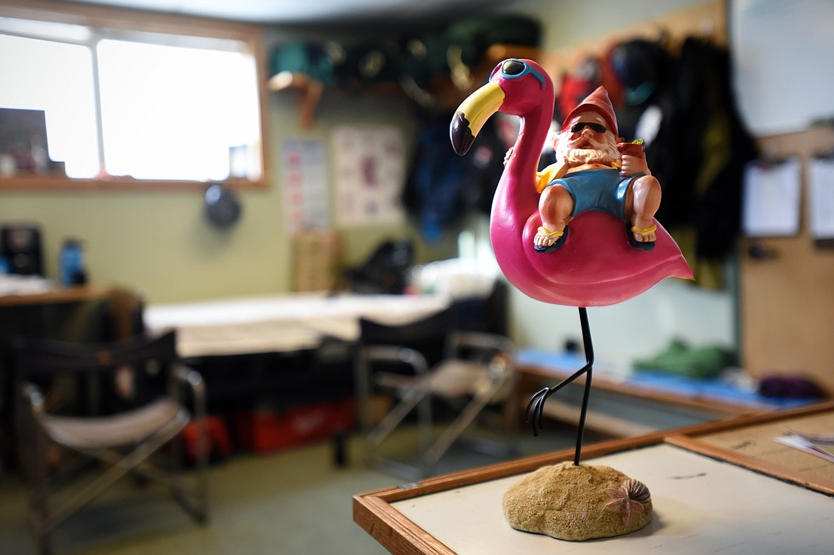 A gnome and pelican figurine on a counter inside the Blacktail Ski Patrol office. A gnome hunt is a part of the ski patrols&#146; annual fundraiser.