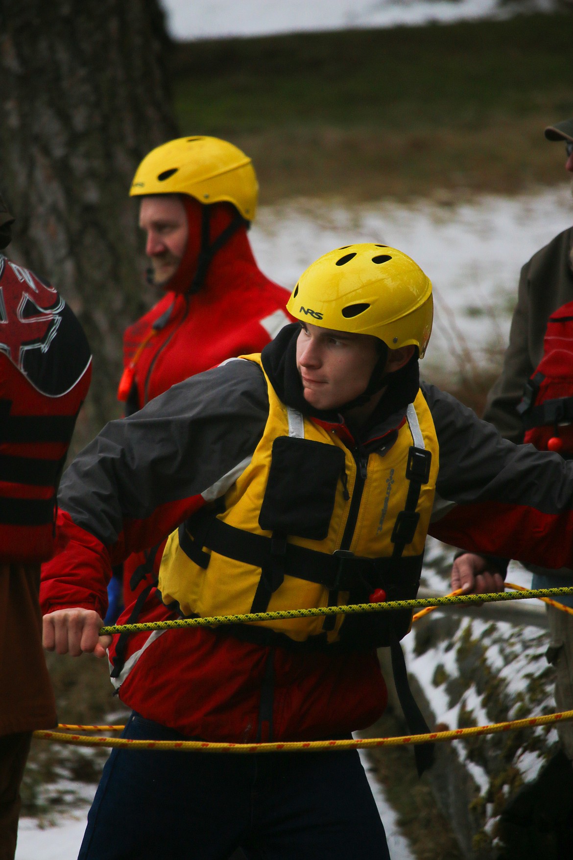 Photo by MANDI BATEMAN 
The firefighters took turns practicing different rescue roles, both on land, on the ice, and in the water.