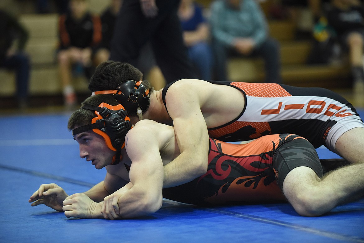 Plains-Hot Springs 138-pounder Conrad Vanderwall, bottom, placed second at Saturday&#146;s Class B-C Divisional Tournament to advance to the state meet. (Scott Shindledecker/Valley Press)