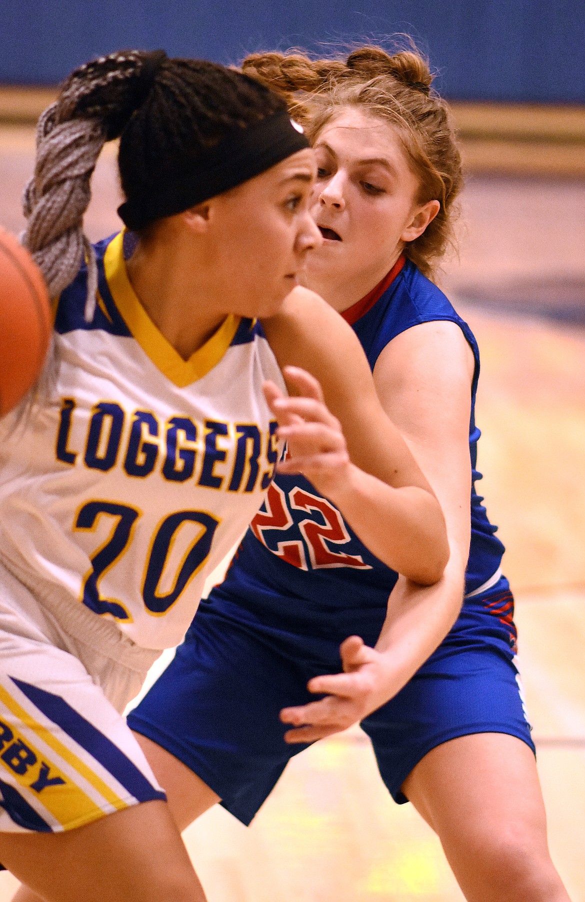Libby&#146;s Olivia Gilliam-Smith drives the baseline in a Feb. 7 home game against the Columbia Falls Wildkats. (Duncan Adams/The Western News)