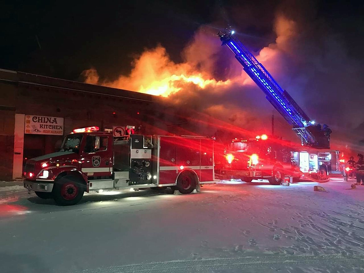 (Fire photo/courtesy SELKIRK FIRE RESCUE &amp; EMS)
Flames and smoke pour from several buildings in Sandpoint&#146;s Historic District in the early hours of Monday, Feb. 11, 2019, as fire crews from around the region work to bring the blaze under control.