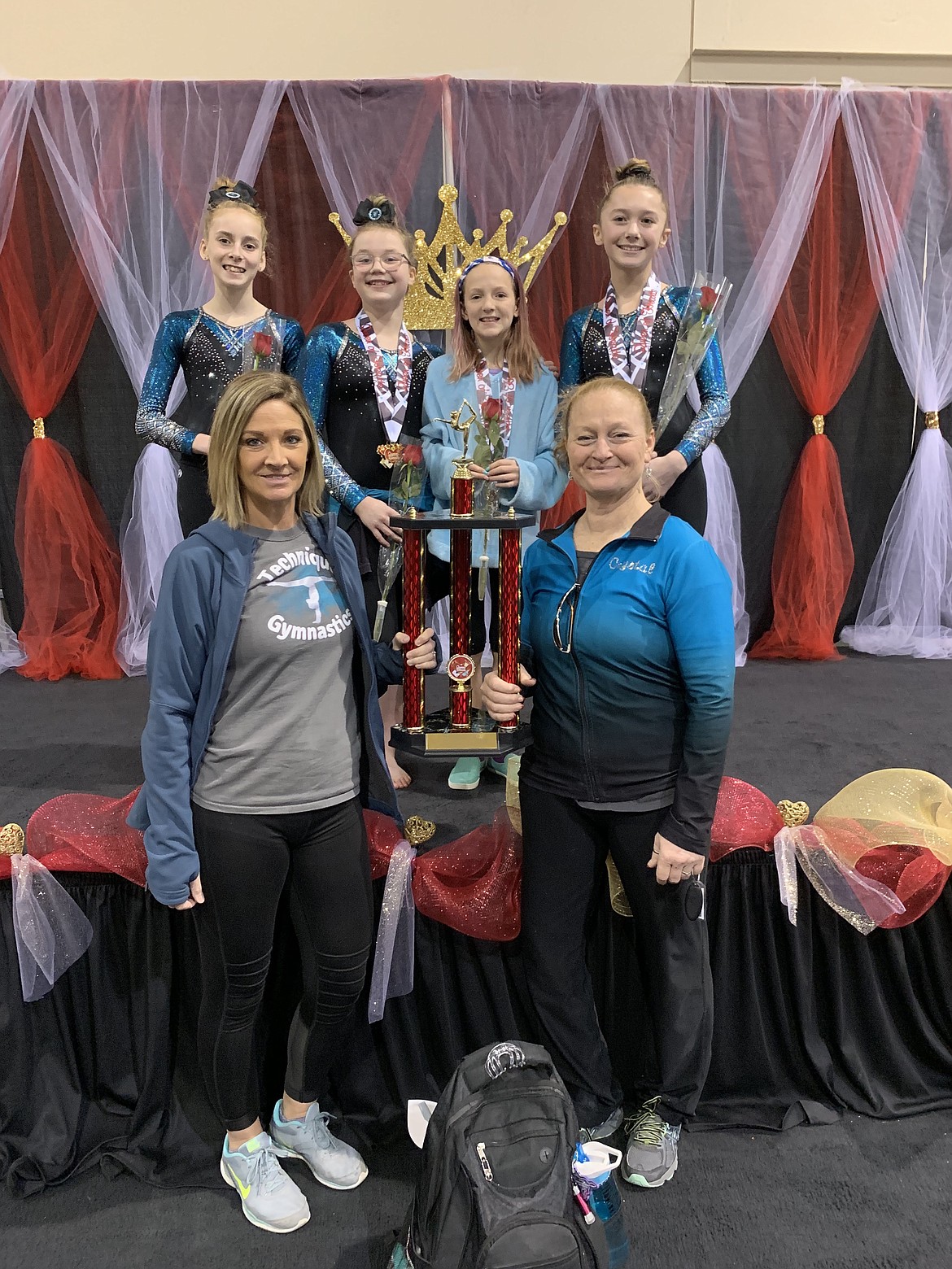 Courtesy photo
Technique Gymnastics Level 6s took home the 3rd Place Team Award at the Queen of Hearts Invitational in Boise. In the front from left are coaches Suni Crawford and Crystal Tonto; and back row from left, Naomi Fritts, Khloe Martin, Cadence Wurster and Dianna Bustillos.