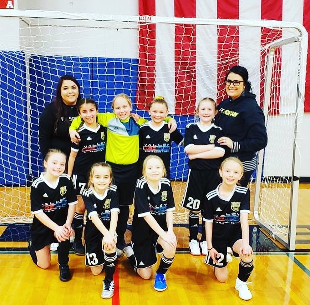 Courtesy photo
FC North Idaho girls 2010/2009 beat the Timbers-Thorns in Friday night&#146;s futsal game at the HUB Sports Center in Liberty Lake. In the front row from left are Eva Berzoza, Lexi Barth, Ava Reichert and Abigale Smith; and standing from left, assistant coach Nora Flores, Gabriella Navarrete, goalkeeper Zoey Flerchinger, Abigail McArthur, Kenzie Rix and director of coaching Ashley Rider.