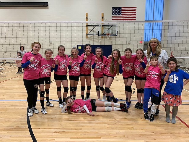 Courtesy photo
The 208 U12 Green volleyball team went undefeated and won its division at the Sideout Winter Classic at Northwood Middle School in Spokane last weekend. From left are Emily Shafer (manager), Olivia Hollenbeck, Caroline Sisk, Camryn Farrar, Hannah Shafer, Hallie Whitmire, Avelyn Johnston, Aubrey Baker, Mia Carr, coach Jessica Trevena, Jensen Trevena, Hailey Shafer, and Bridget Maiani (lying on floor).