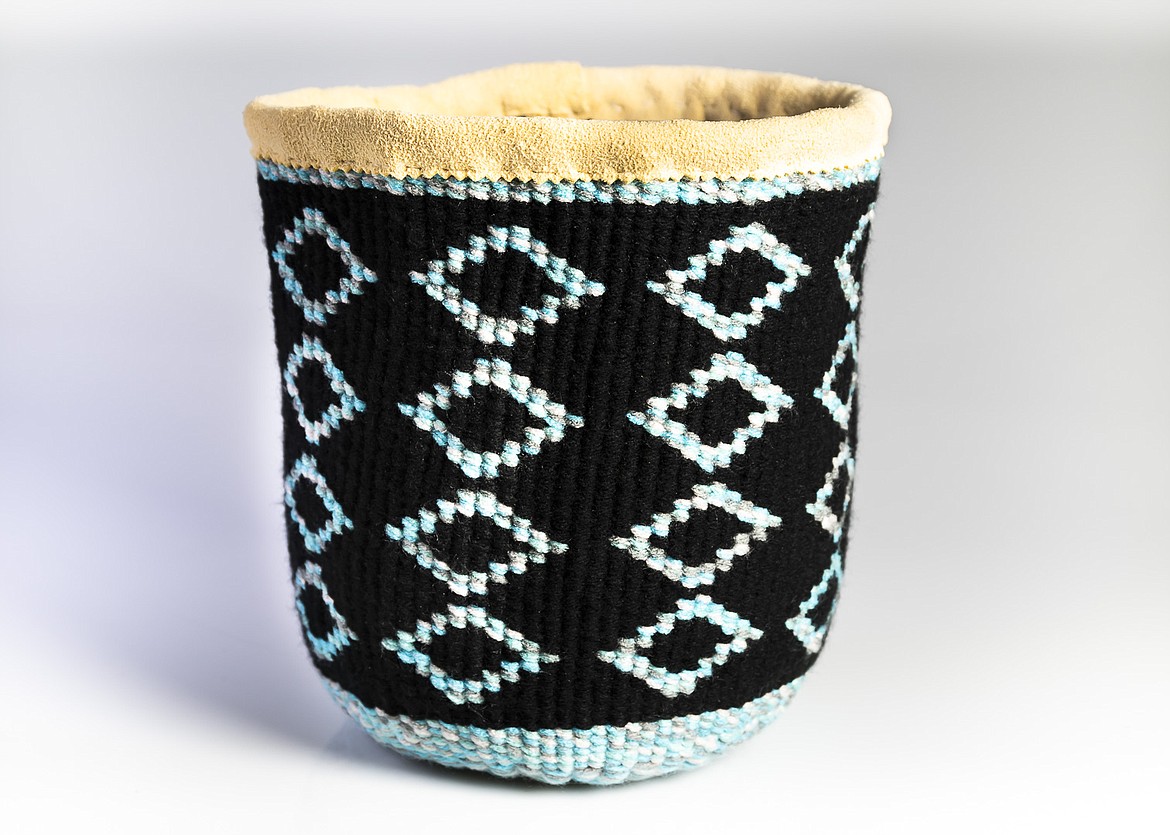 Leanne Campbell, a member of the Coeur d&#146;Alene Tribe, created this basket with hemp twine and acrylic yarns. It is from a series called &#147;She Who Watches&#148; and inspired by Columbia Plateau rock art. (Courtesy photo)