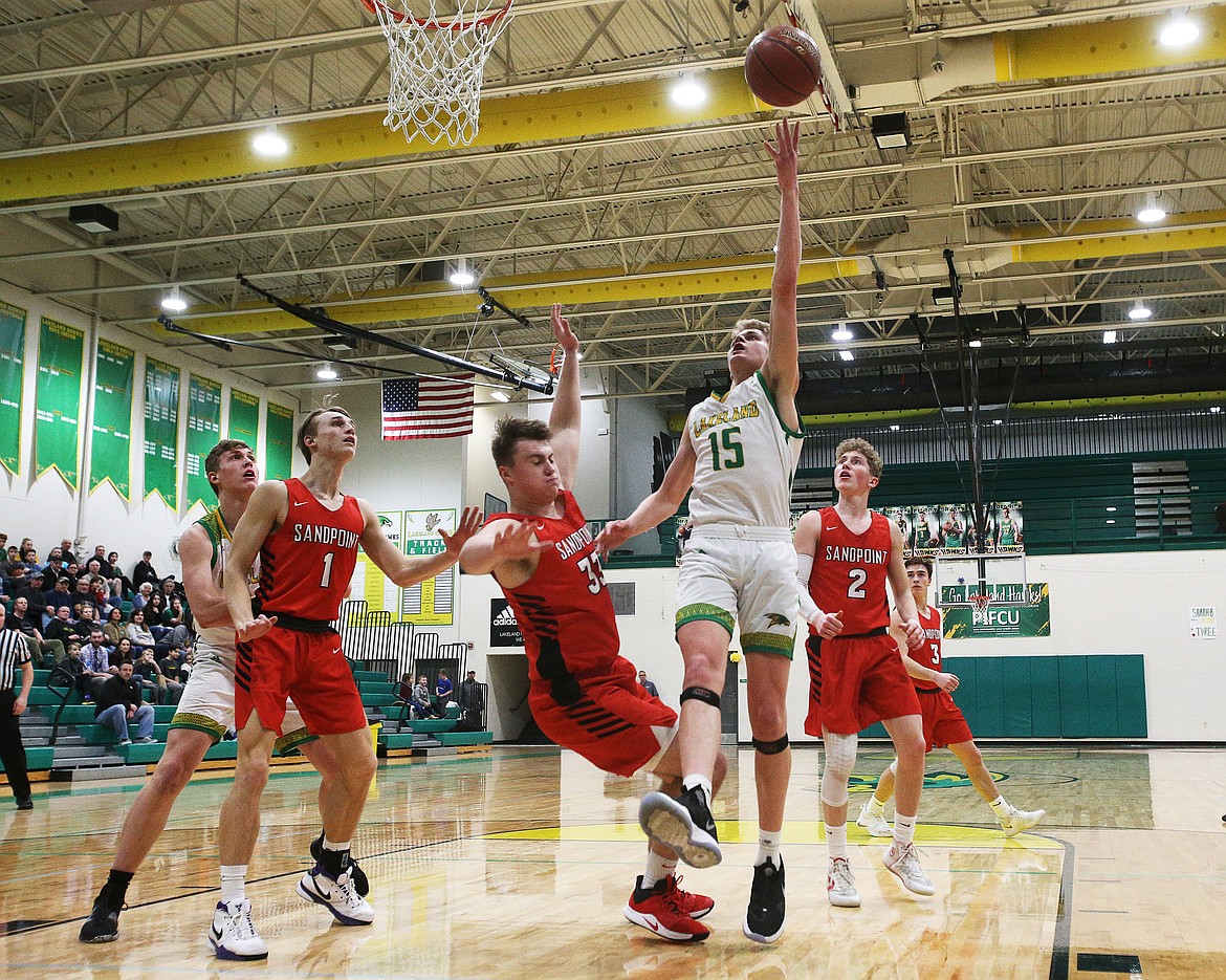 Photos: LOREN BENOIT/Press 
Lakeland High&#146;s Noah Haaland goes for a layup during Monday&#146;s 79-67 win over visiting Sandpoint.