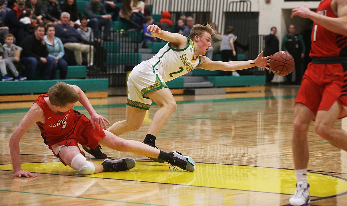 Lakeland High&#146;s Ben Zubaly goes after a loose ball during Monday&#146;s game against Sandpoint.