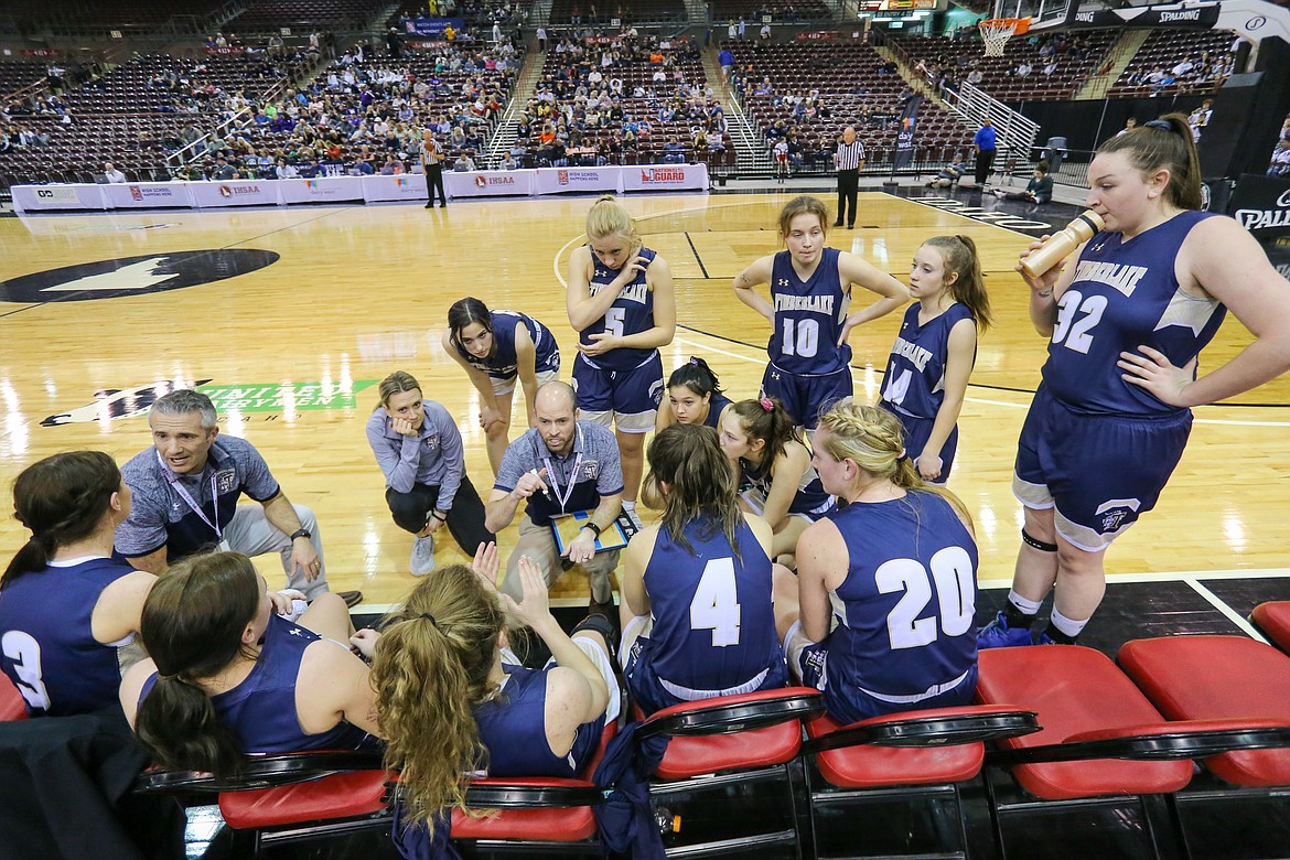 Photo by JASON DUCHOW PHOTOGRAPHY
Timberlake coach Matt Miller gives instructions to his players in the state 3A girls championship game against Snake River on Saturday at the Ford Idaho Center in Nampa.