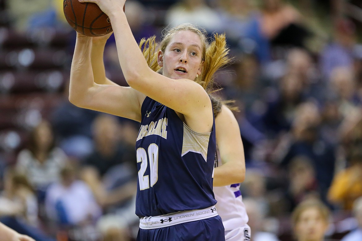 Photo by JASON DUCHOW PHOTOGRAPHY
Timberlake&#146;s Brooke Jessen looks for a teammate in the state 3A girls championship game against Snake River on Saturday at the Ford Idaho Center in Nampa.