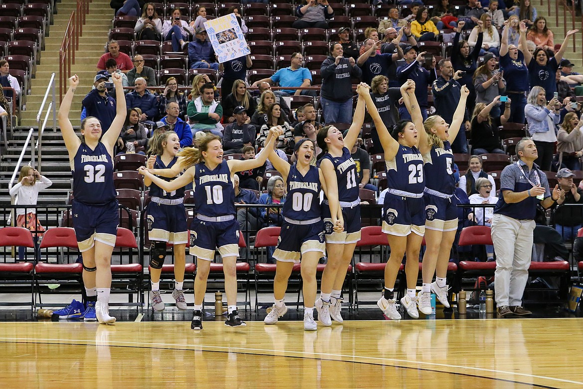 Photo by JASON DUCHOW PHOTOGRAPHY
Players on the Timberlake bench celebrate in the final seconds against Snake River in the state 3A girls championship game Saturday at the Ford Idaho Center in Nampa.