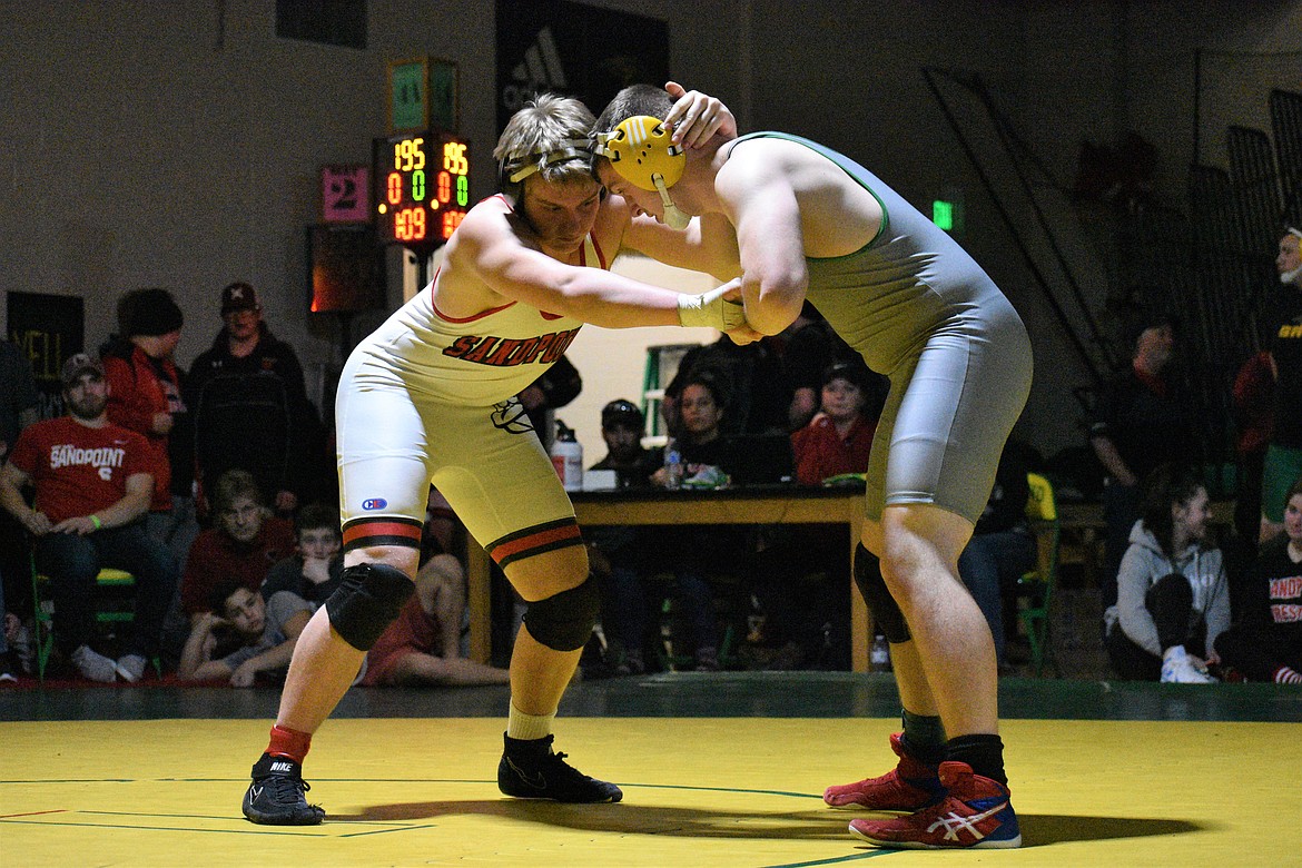 (Photo by DYLAN GREENE)
Sandpoint senior Jake Suhr faces off with Lakeland&#146;s Hayden Berger on Saturday in the 195-pound championship match.