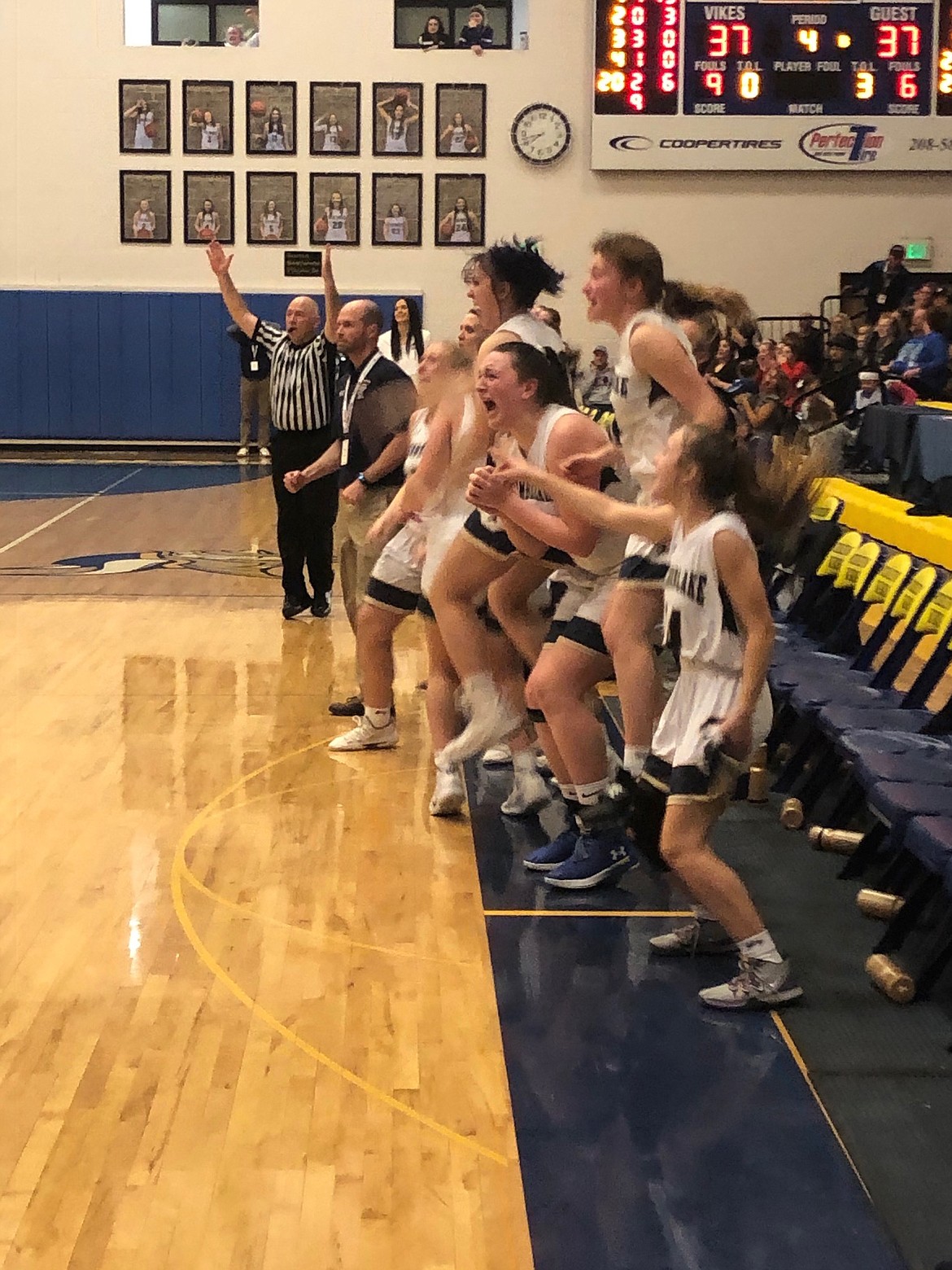 Timberlakes bench erupts after Taylor Sukos 3-point basket tied the game at the end of the first overtime vs. Sugar-Salem in the first round of the state 3A girls basketball tournament Thursday at Middleton High.

JASON ELLIOTT/Press