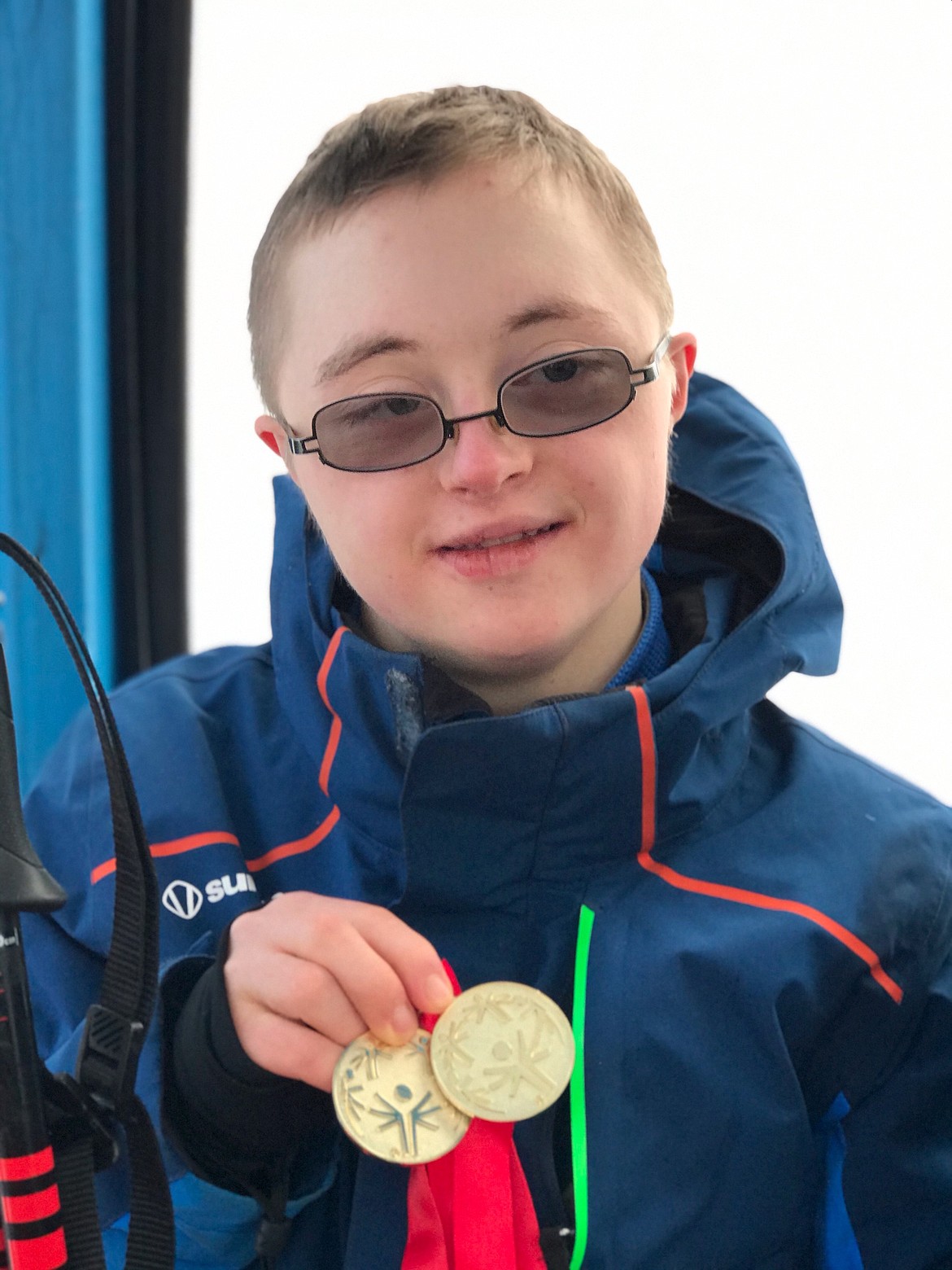 (Photo courtesy of CHRIS PAINTER)
Campbell Wyman holds up the two gold medals he earned at Idaho&#146;s Special Olympics Winter Games on Feb. 8.