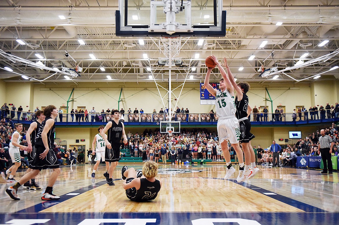 Glacier's Drew Engellant (15) looks to shoot against Flathead during a crosstown matchup at Glacier High School on Friday. (Casey Kreider/Daily Inter Lake)