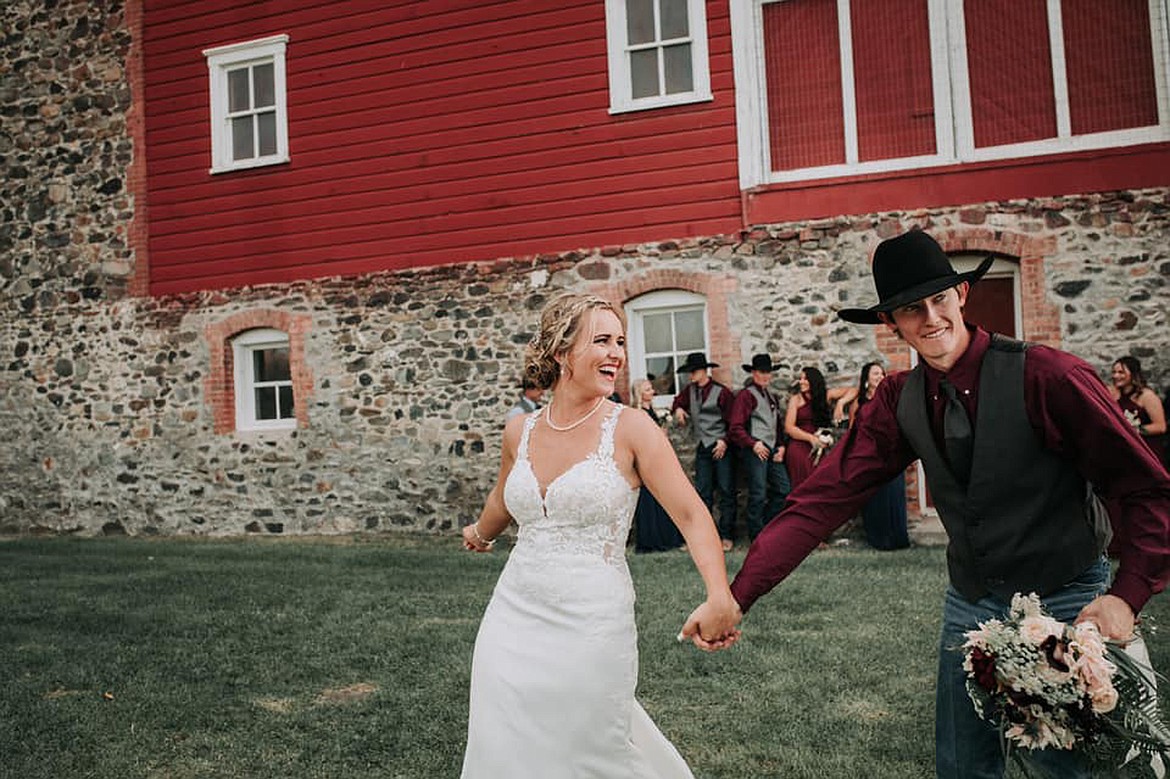 Payton and Katelynn Fitzpatrick on their wedding day at Kleffner Ranch in East Helena last September. (MKate Photography photo)