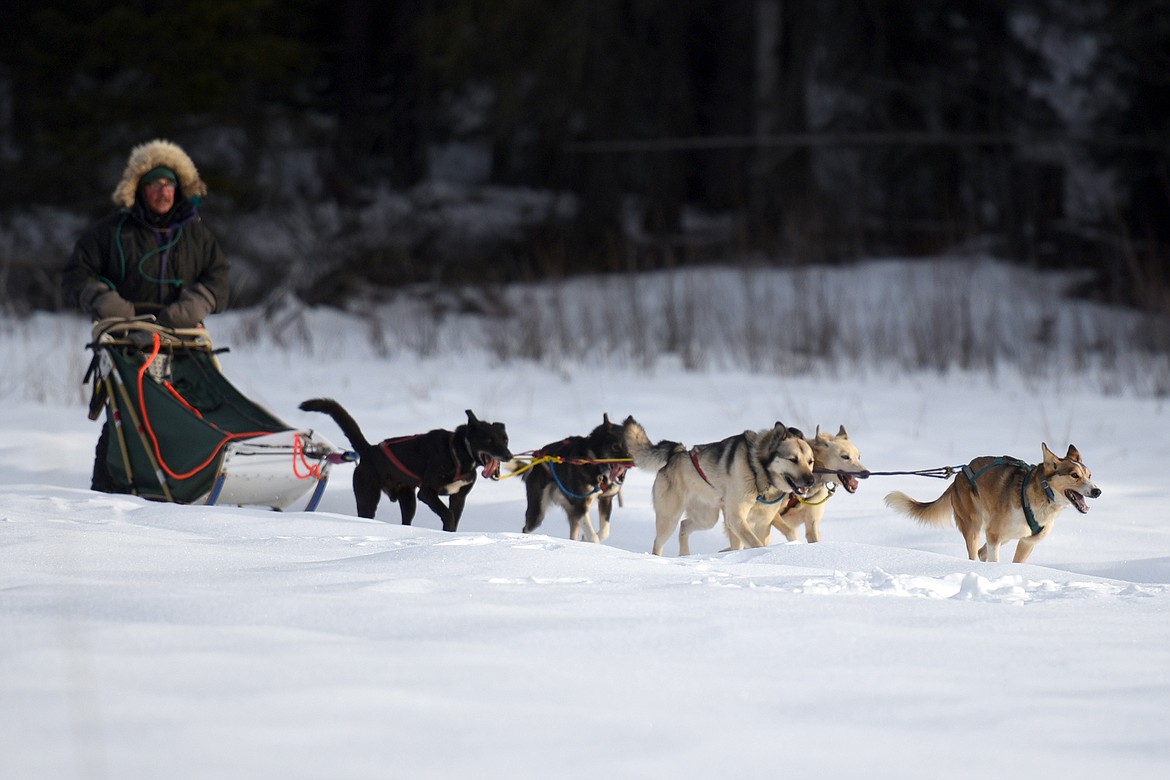 Butch Parr takes his team on a training run.