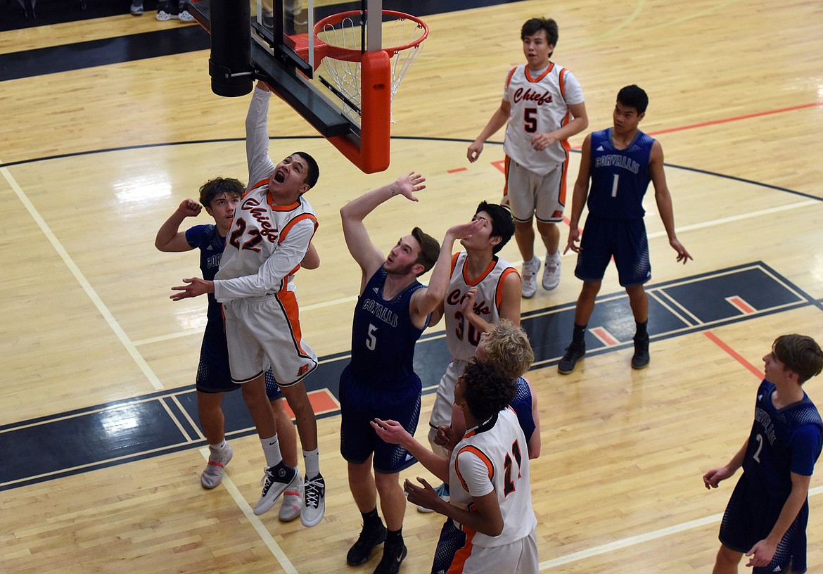 Ronan senior Saul Blackweasel drives to the basket verses Corvallis last Thursday as the Chiefs won 47-44 at home on senior night. (Whitney England/Lake County Leader)