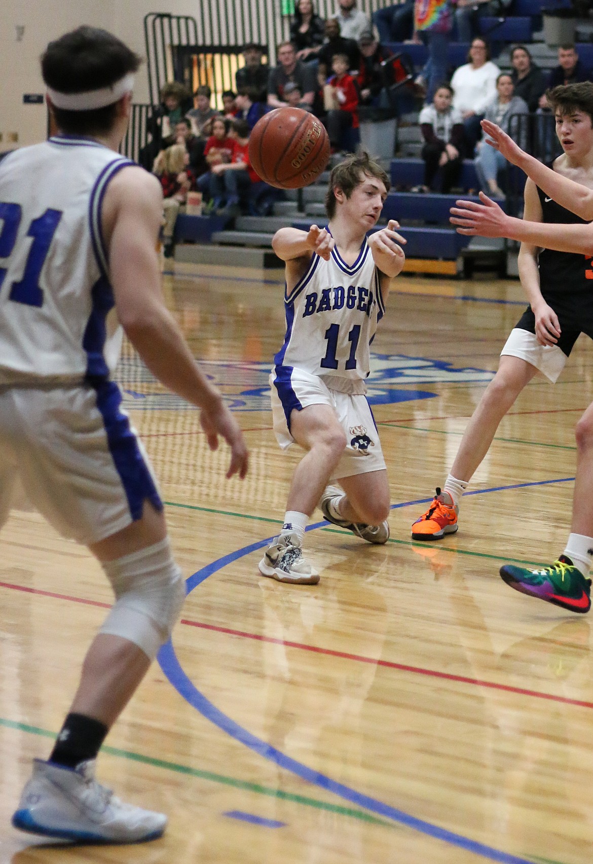 Photo by MANDI BATEMAN 
Elijah Dahl passes the ball.