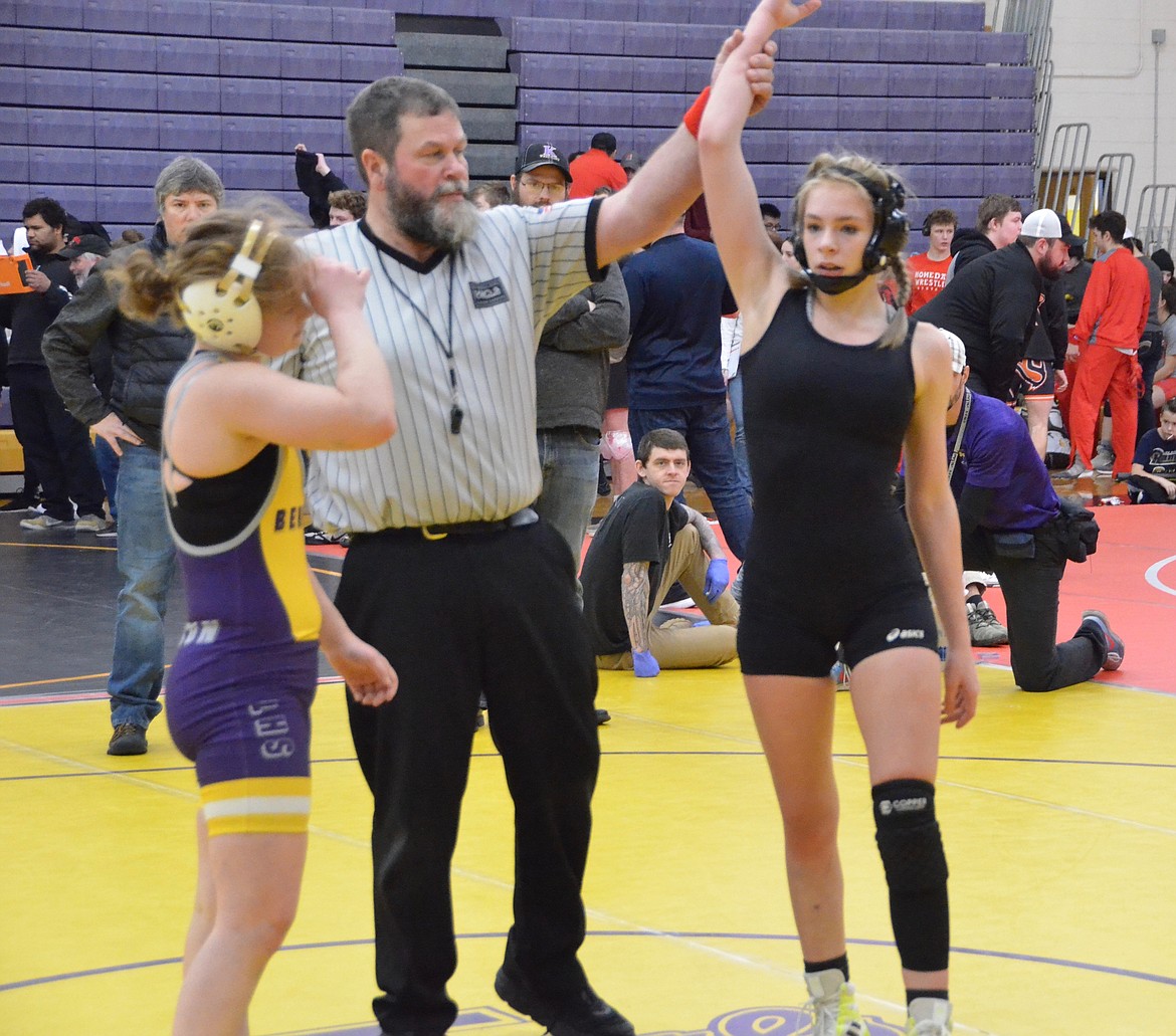Courtesy image/ Wildcat wrestler Taylor Stovern has her hand raised in victory following a recent win in Lewiston. Stovern took fifth place at last week&#146;s Girls State Tournament in Pocatello.