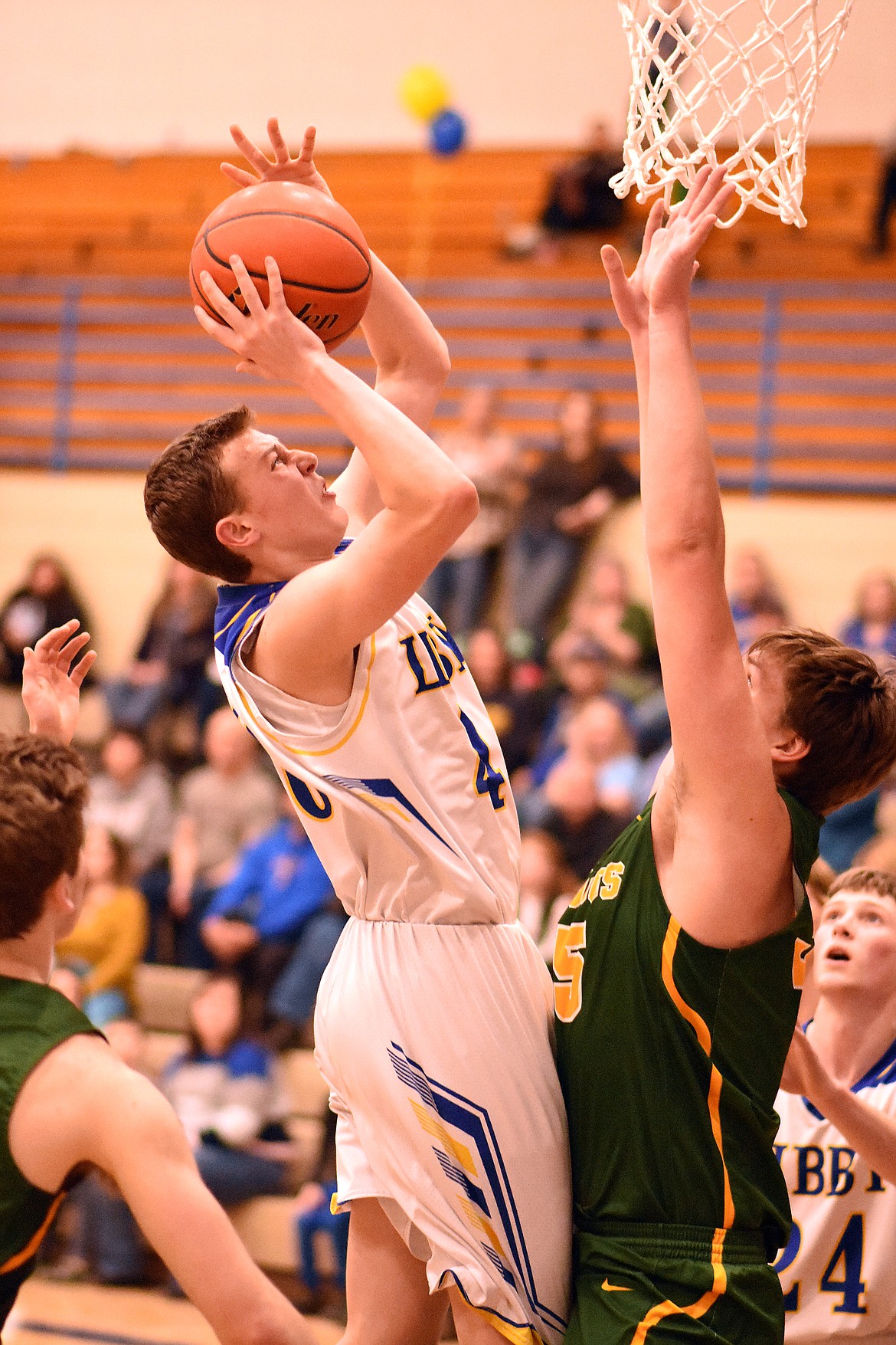 TJ Andersen goes up for a shot Feb. 21 against the Whitefish Bulldogs. (Duncan Adams/The Western News)