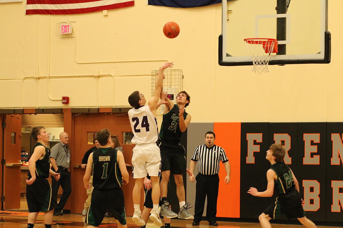 Clark Fork&#146;s Carson Callison shoots over Lincoln in consolation final play. (Chuck Bandel/Mineral Independent)