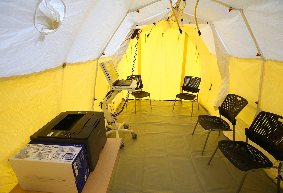 The tent serves the purpose of registering patients being tested, and collecting the necessary samples to be sent to the state or other designated site for testing. (LOREN BENOIT/Press)