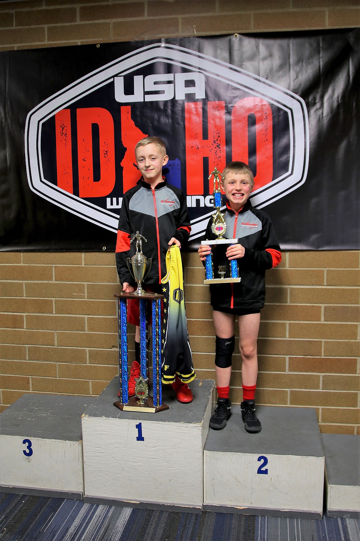 (Photo courtesy of TAMI WOOD)
Tyler Wood and Zak Wood each placed at the Idaho Folkstyle State Tournament in Meridian, Idaho on Feb. 8. Tyler took first at 63 pounds and Zak was runner up at 67 pounds in the 10U division.