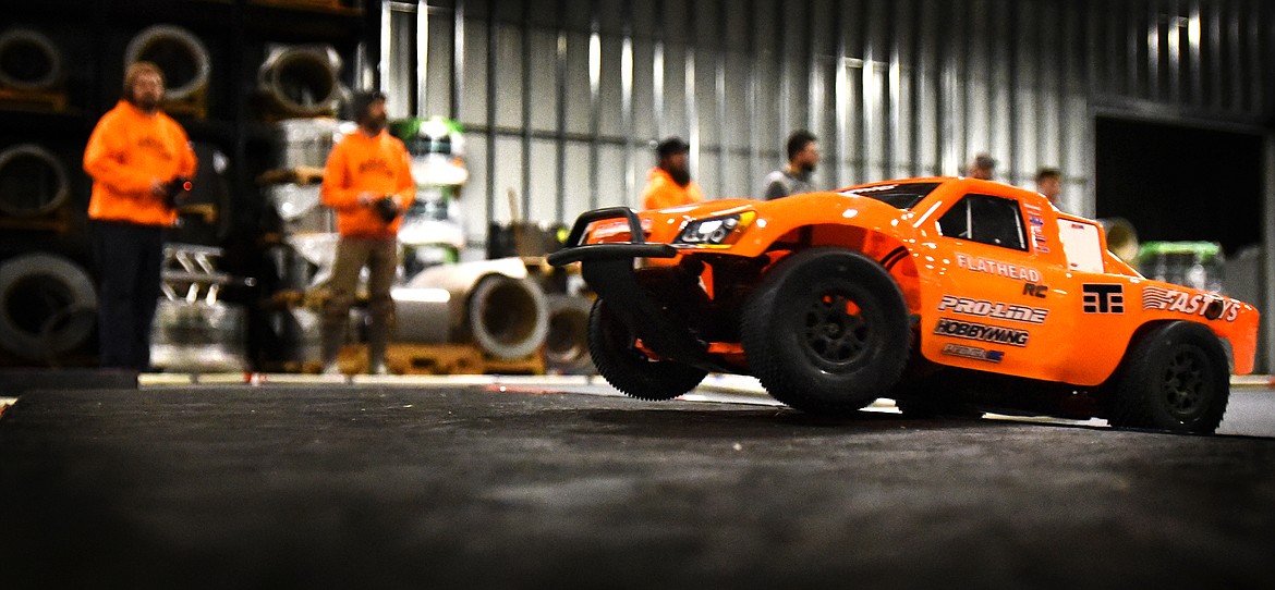 Members of the Flathead RC group practice their racing skills at Glacier Steel Roofing Products Thursday. (Jeremy Weber/Daily Inter Lake)