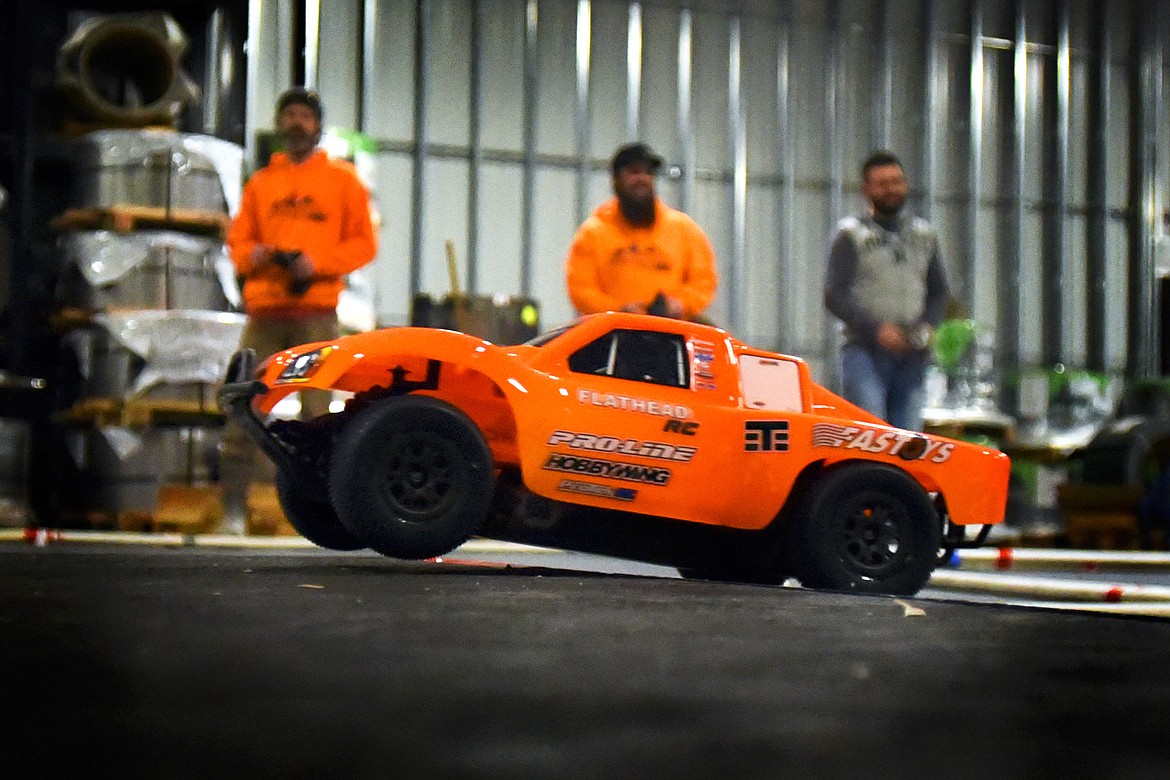 Members of the Flathead RC group practice their racing skills at Glacier Steel Roofing Products Thursday. (Jeremy Weber/Daily Inter Lake)