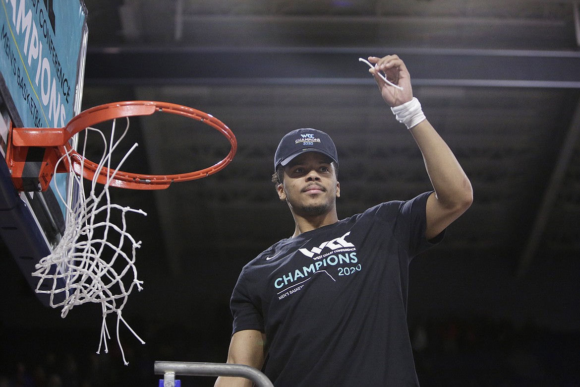 Gonzaga guard Admon Gilder holds a piece of the net after the team won the West Coast Conference regular season title, beating Saint Mary&#146;s on Saturday in Spokane.

YOUNG KWAK/Associated Press