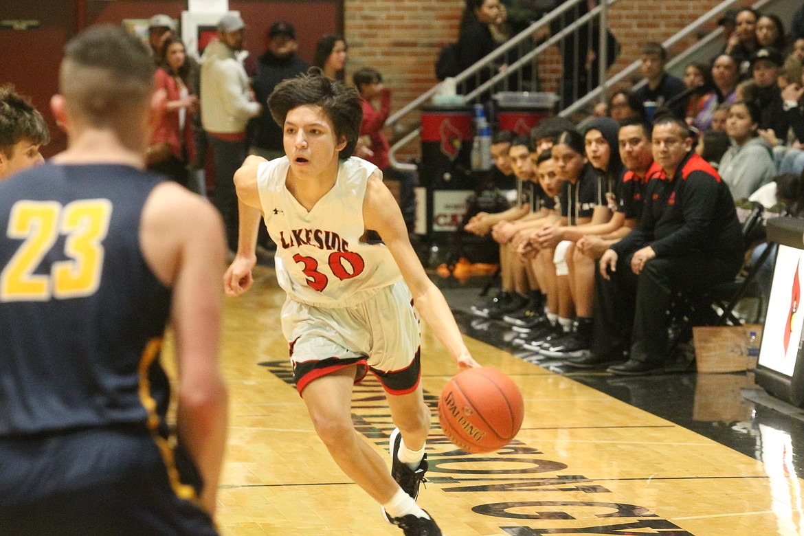 MARK NELKE/Press
Lakeside junior Kenyon Spotted Horse drives to the basket during last Thursday&#146;s 1A Division II District 1 championship game vs. Genesis Prep at North Idaho College.