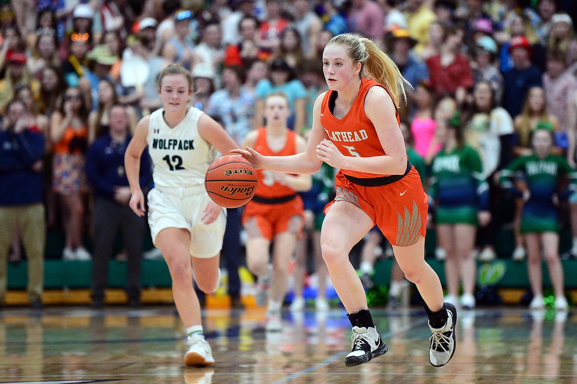 Flathead's Maddy Moy (5) brings the ball upcourt against Glacier during a crosstown matchup at Glacier High School on Friday. (Casey Kreider/Daily Inter Lake)