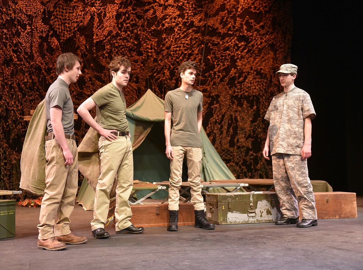 Nathan Sproul, Dashiell Schindler, Chaz Gillette and Gavin Carmichael reherse a scene from &#147;MASH&#148; at the Whitefish Performing Arts Center. The Whitefish High School Drama Club brings the play to the stage on March 5, 6 and 7. (Heidi Desch/Whitefish Pilot)