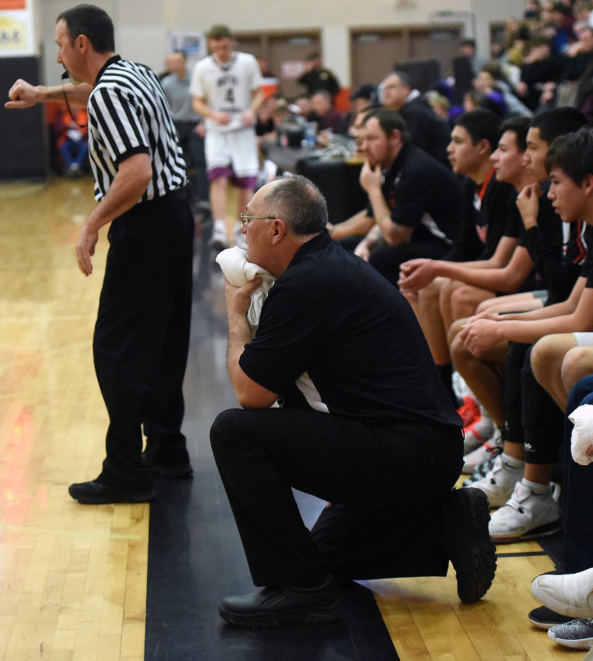 Ronan coach Ron Couture watches from the sidelines as the Chiefs played Butte Central in the first round of the Western A Divisional Tournament Feb 27. This was Couture&#146;s first year as the Ronan Chiefs head coach. (Whitney England/Lake County Leader)