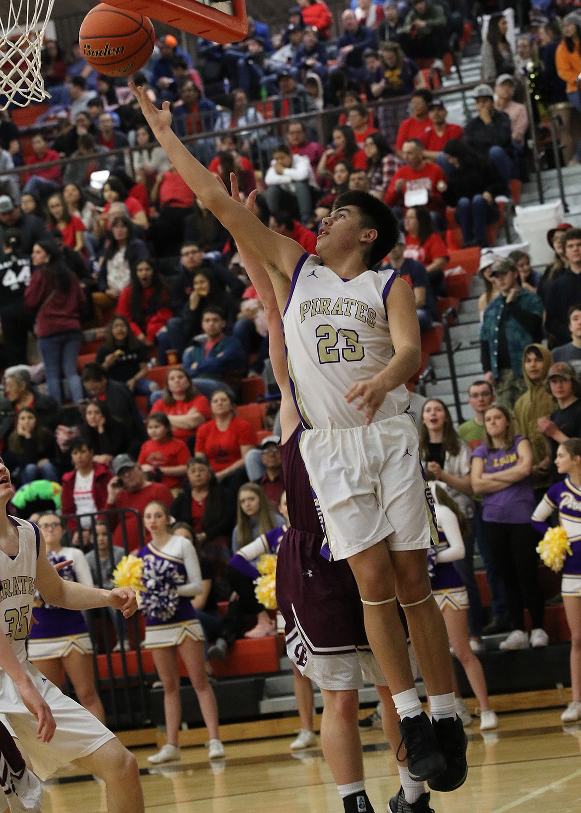 Polson senior Anton Lefthand lays in two of his nine points in the consolation game at the Western A Divsional tournament in Ronan on Saturday. (Bob Gunderson photo)